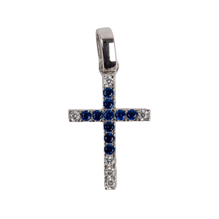 Croix de cou fine en argent 925°/°° sertie de zirconium blanc et bleu H. 1,7 cm (1,22 g). Livrée en boîte