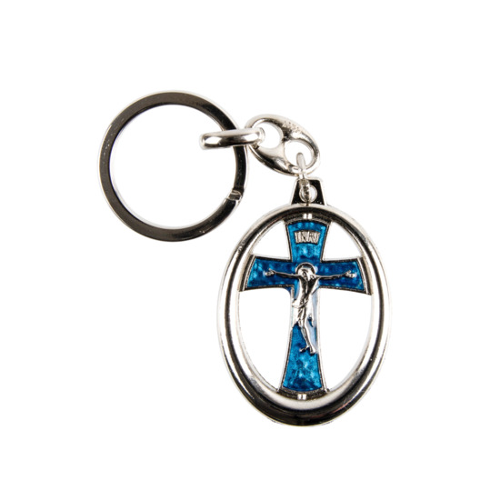 Porte-clés ovale H. 3,9 cm argenté avec croix ajourée, emaillée bleue avec Christ.