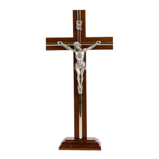 Crucifix en bois foncé et filet couleur dorée, sur socle avec Christ métal couleur argentée - H. 32 cm.