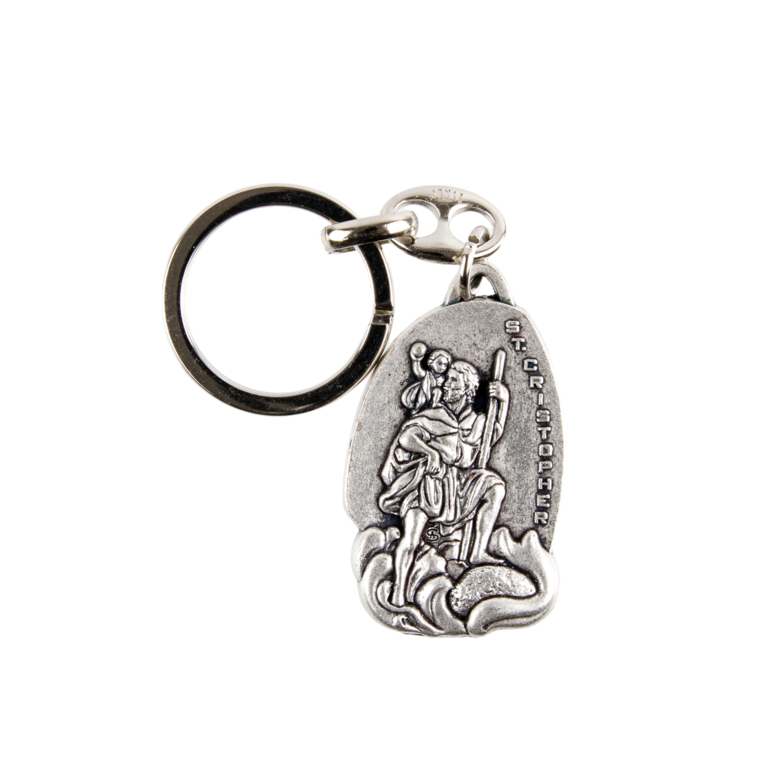 Porte-clés de saint Christophe H. 4 cm en métal couleur argentée.