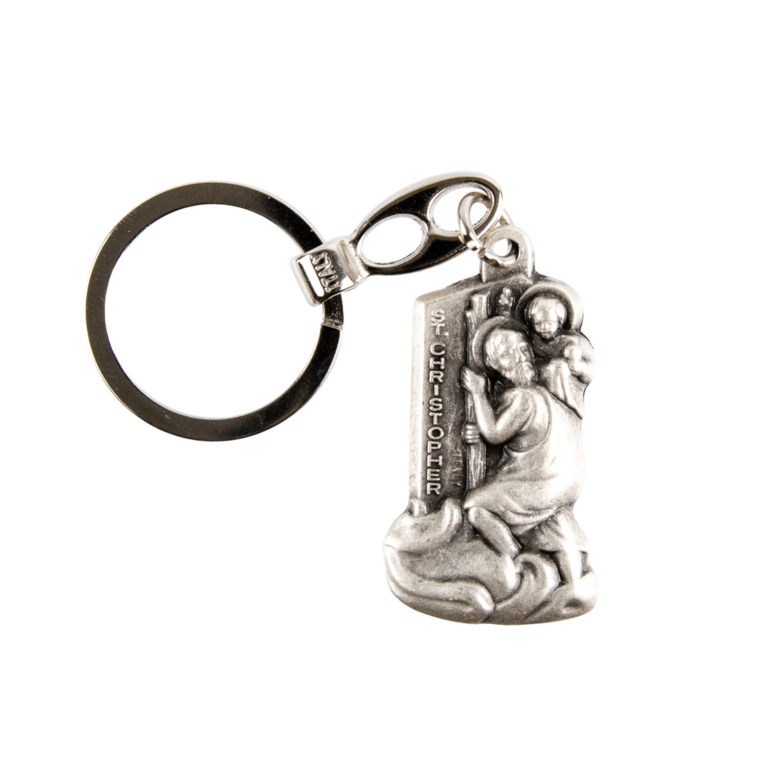 Porte-clés silhouette de saint Christophe H. 4 cm en métal couleur argentée.