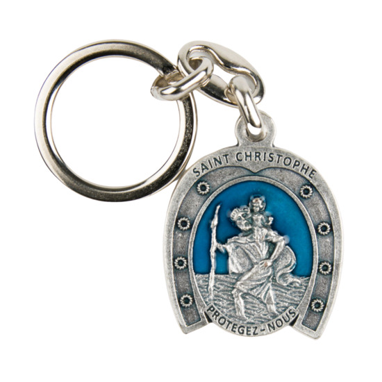 Porte clés de saint Christophe H. 3 cm forme de fer à cheval en métal émaillé bleu.