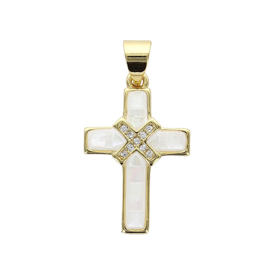 Croix de cou en nacre avec zirconium sertie sur métal couleur dorée H. 2 cm.