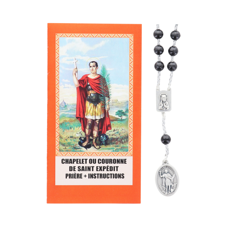 Chapelet de dévotion de saint Expédit grains en plastique avec notice explicative, livré en sachet individuel.