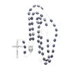 Chapelet grains ovale noir tacheté Ø 7 mm, chaîne couleur argentée, longueur au cœur 38 cm, croix avec Christ.