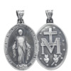 Médaille en argent 925 °/°° vieillie de la Vierge Miraculeuse. Livrée en boîte.