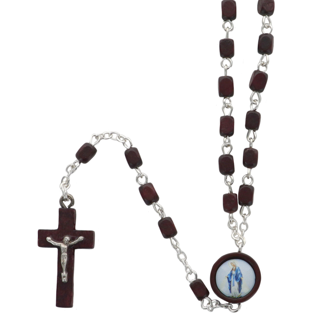 Chapelet sur chaine grains en bois de H. 5 x 4 mm. Longueur jusqu'au coeur 30 cm, coeur en résine, croix avec Christ métal.